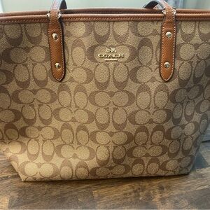 Coach Brown Signature Tote Bag with Leather Trim  15” wide. 10” long. Nonsmoking